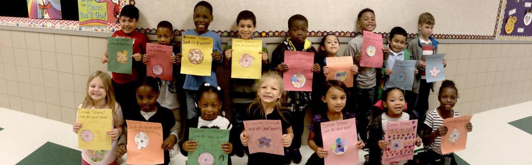 Elementary students display well wishes for upper classmen.