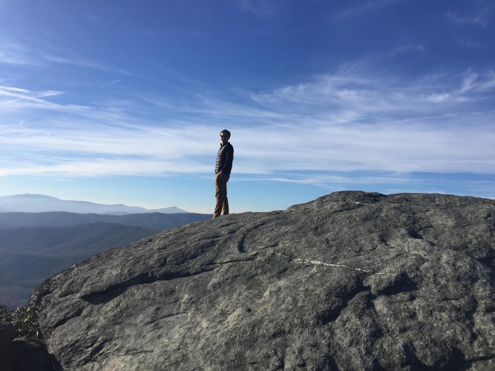 Mr. McCracken standing on a cliff