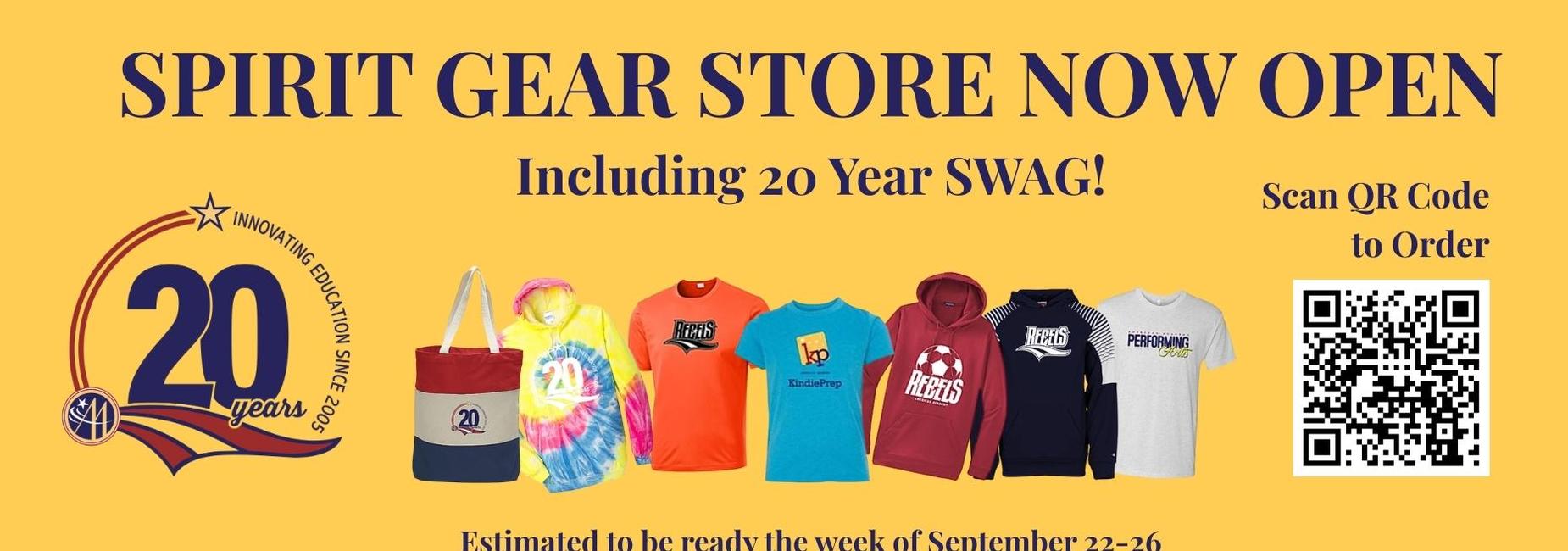 Yellow promotional banner announcing the opening of a spirit gear store, featuring assorted apparel and a QR code.