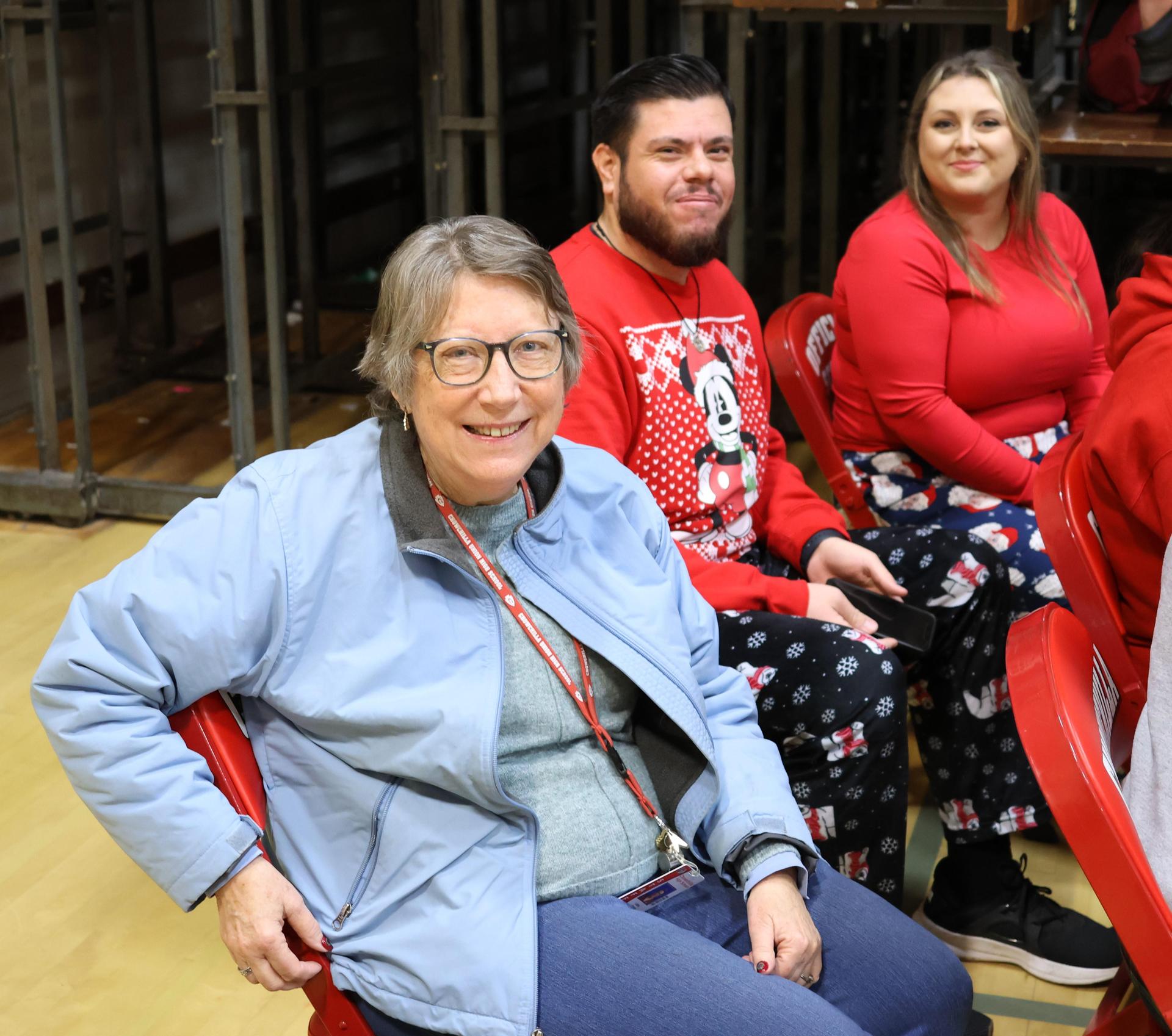 students and staff posing at the winter wishes rally