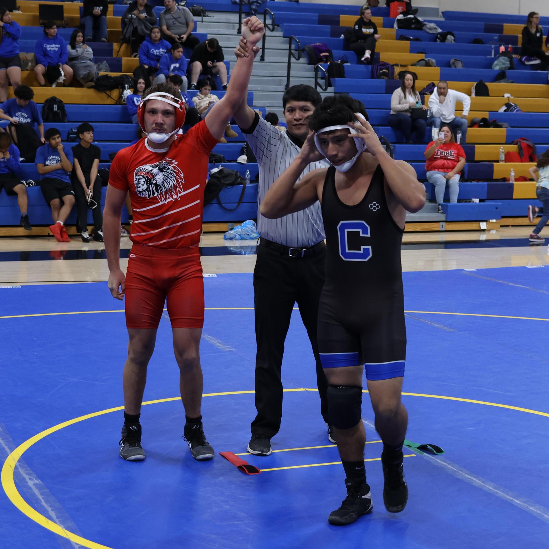wrestlers in action at parlier