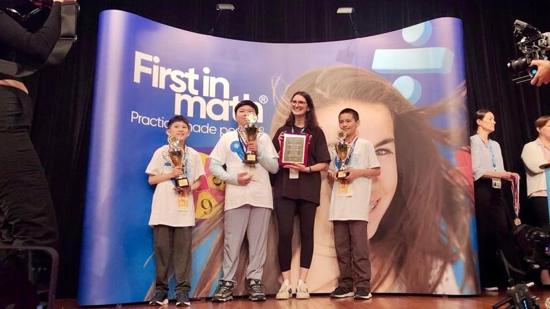 Math team holding their trophies