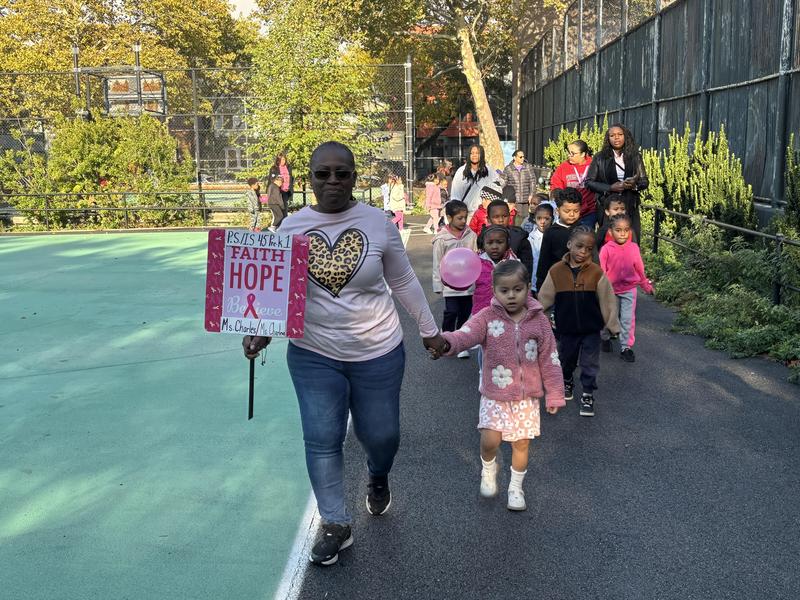 Students walking a pledged amount