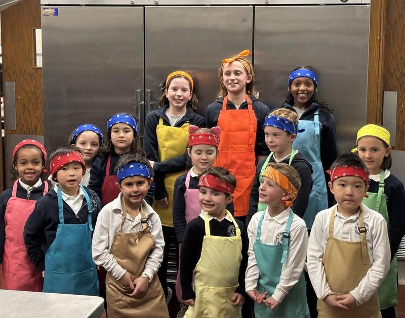 K1-Grade 5 students in aprons