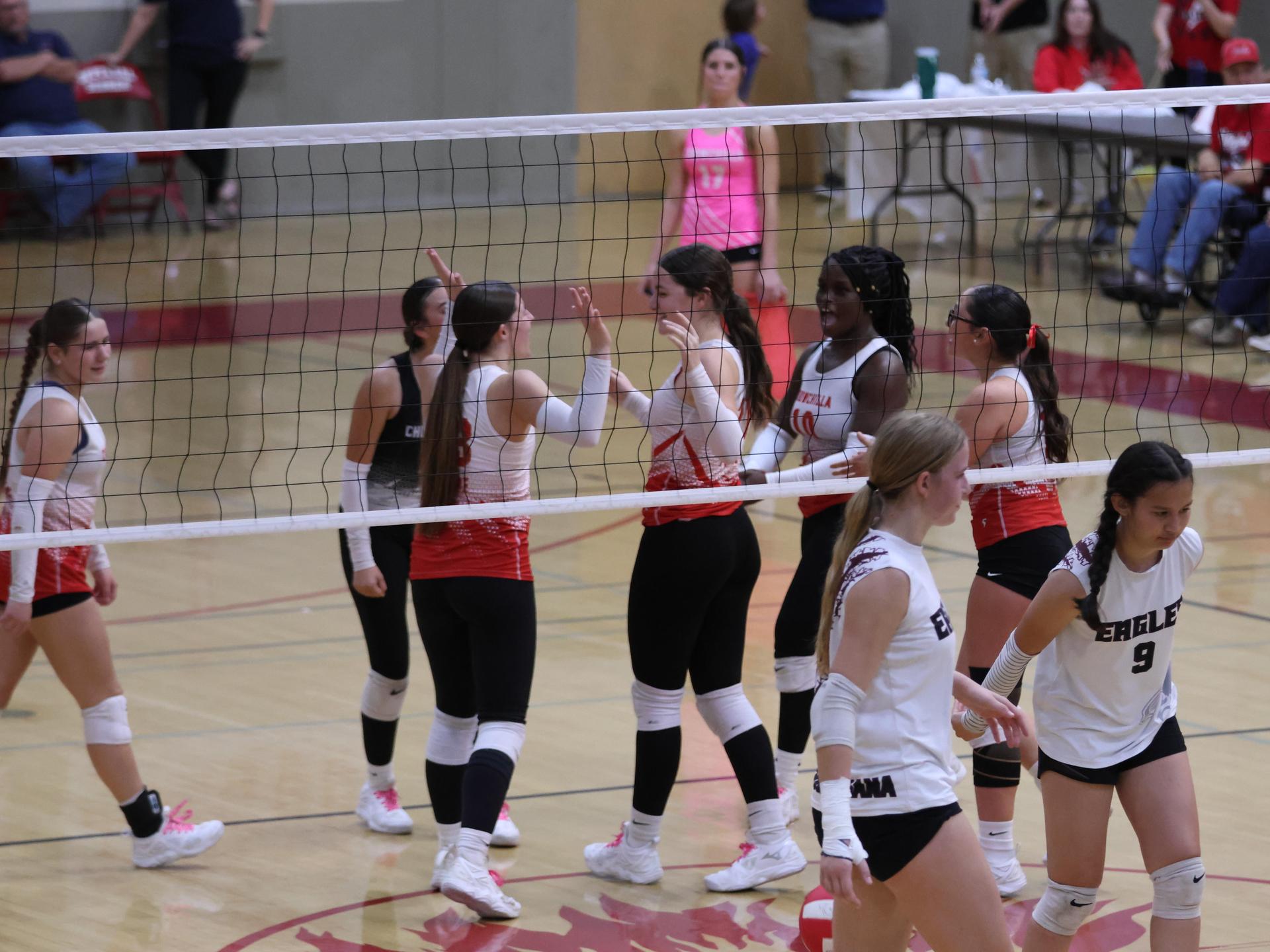 Varsity Volleyball playing vs. Fresno Christian 56