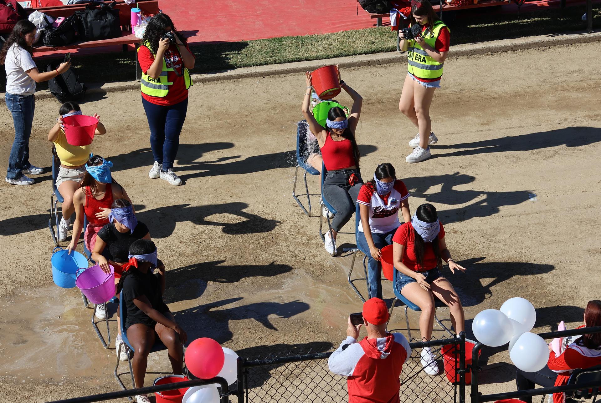 students and staff at the homecoming rally