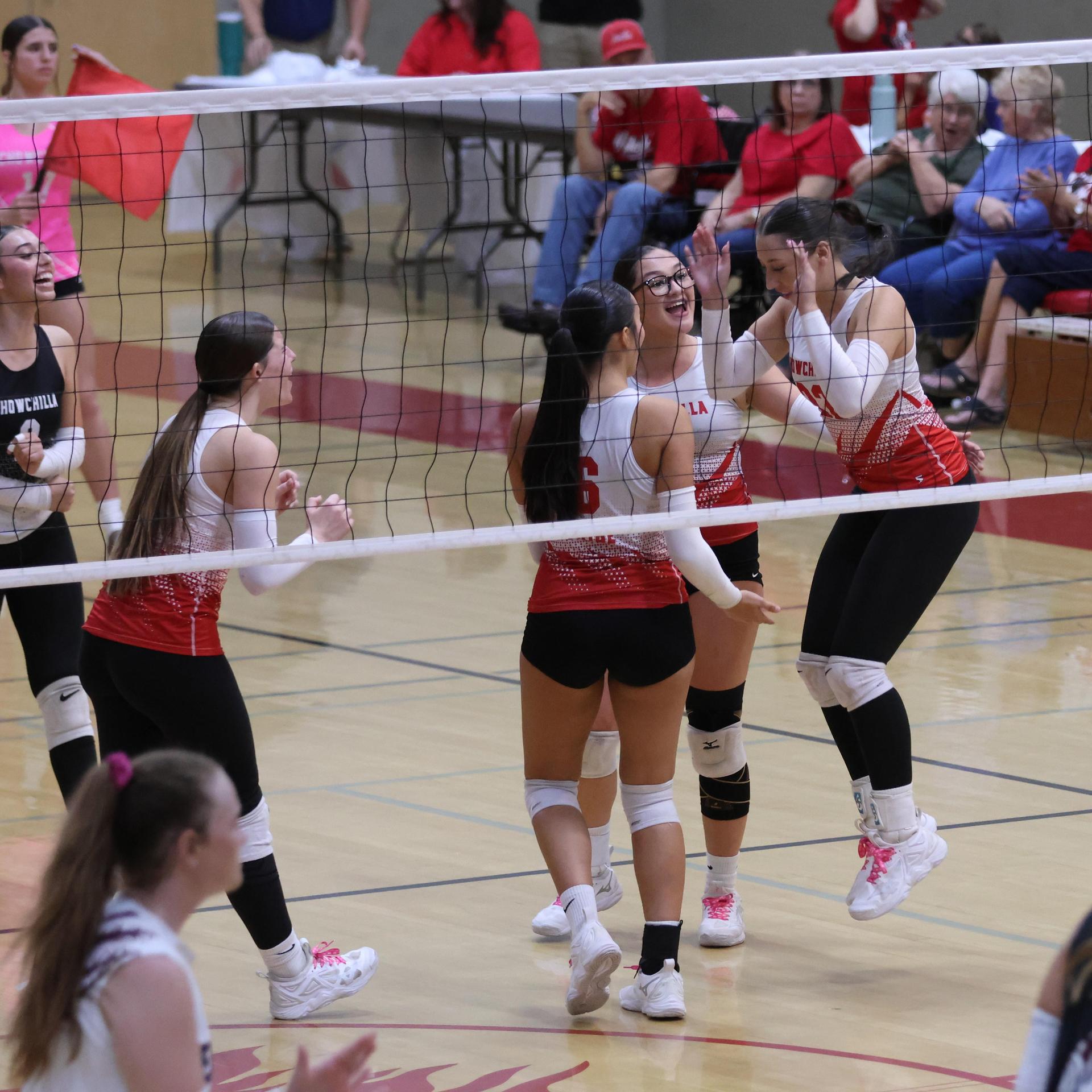 Varsity Volleyball playing vs. Fresno Christian 63