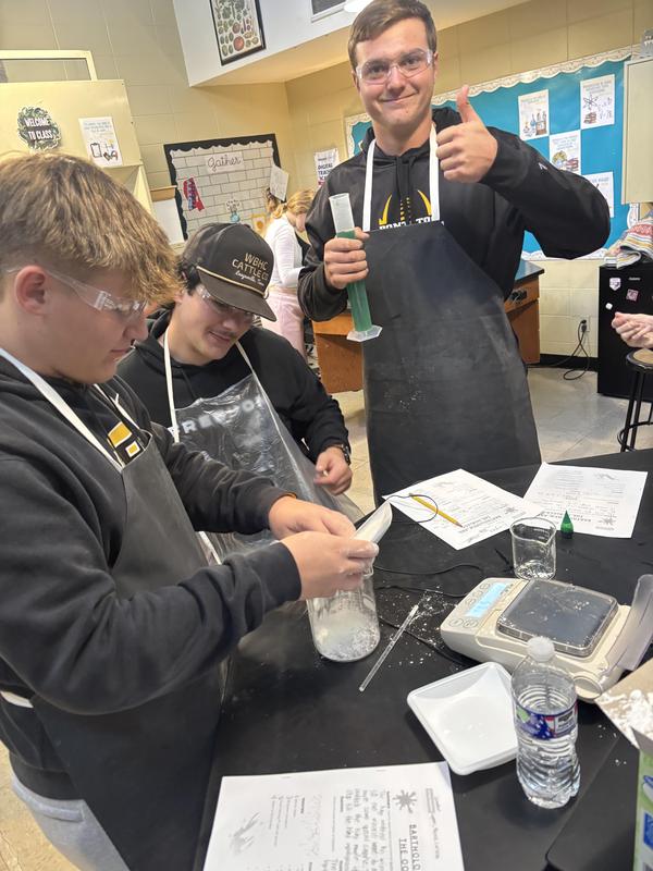 three boys doing the experiment