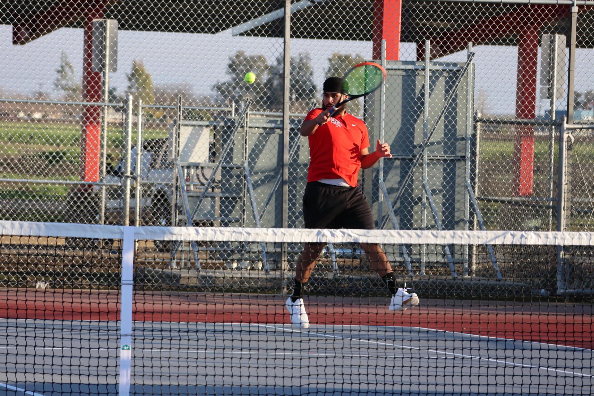 CUHS Boys playing tennis against coalinga