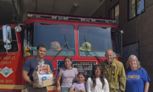 firefighters with students