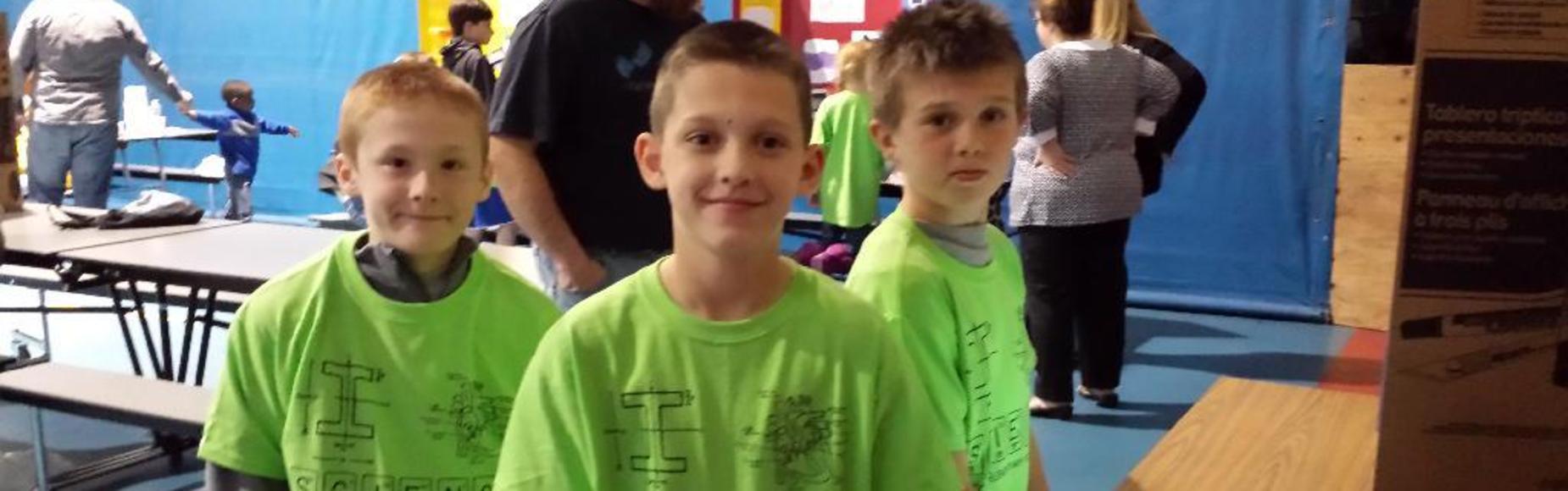 Students in Green Shirts