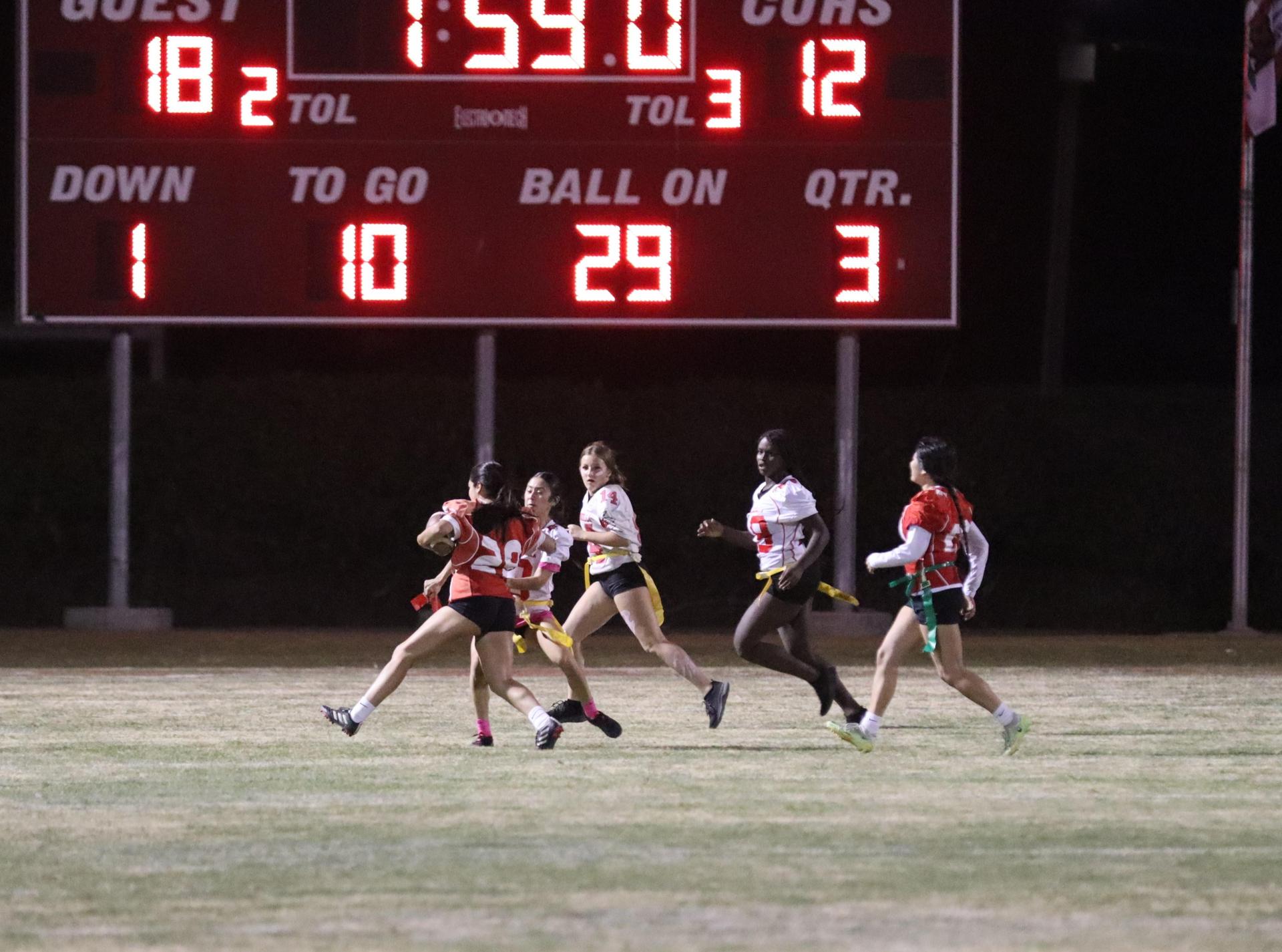 girls playing flag football