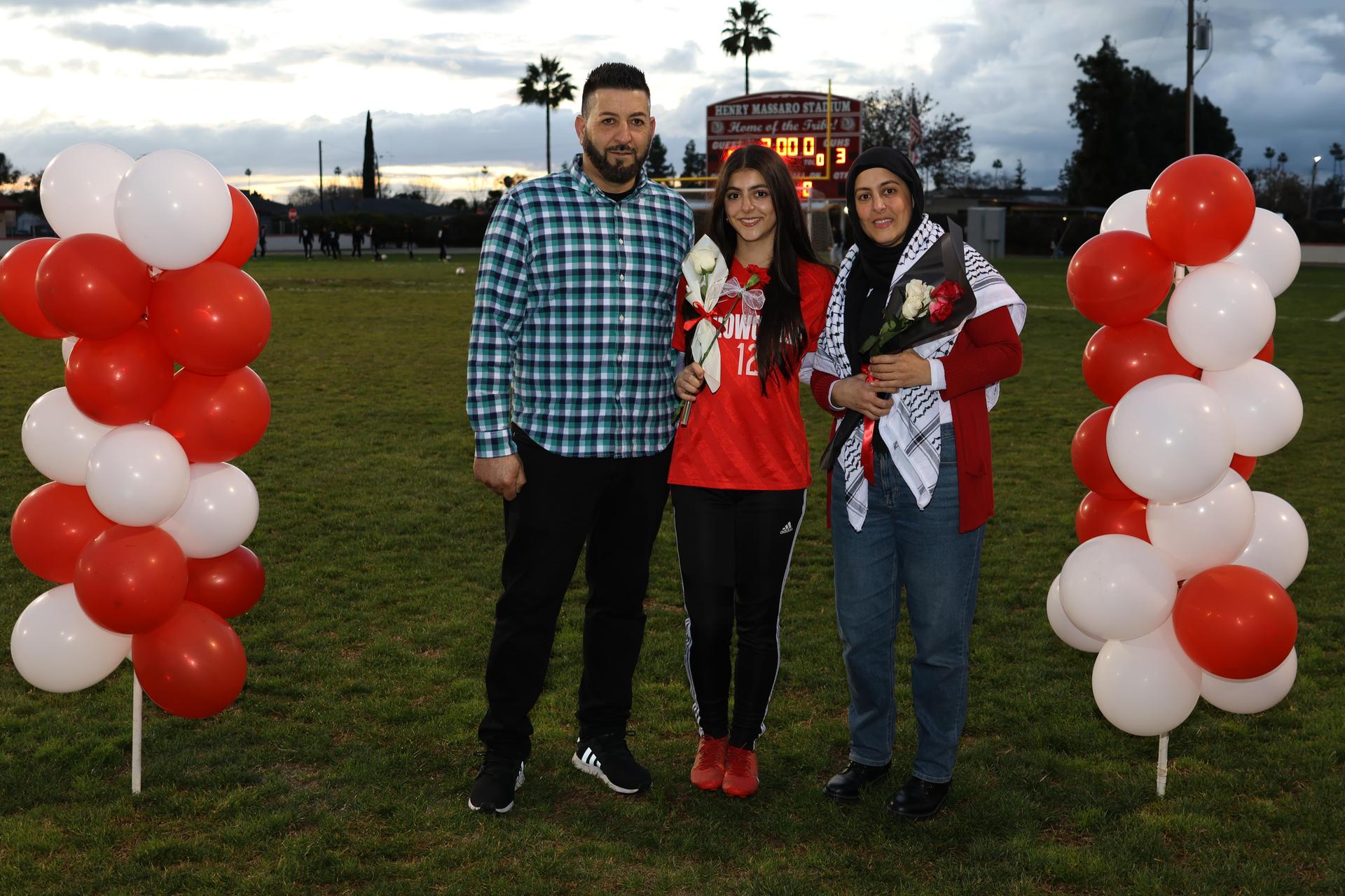 seniors posing with their escorts