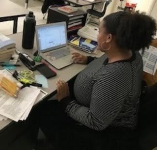 Teacher instructing distance learning