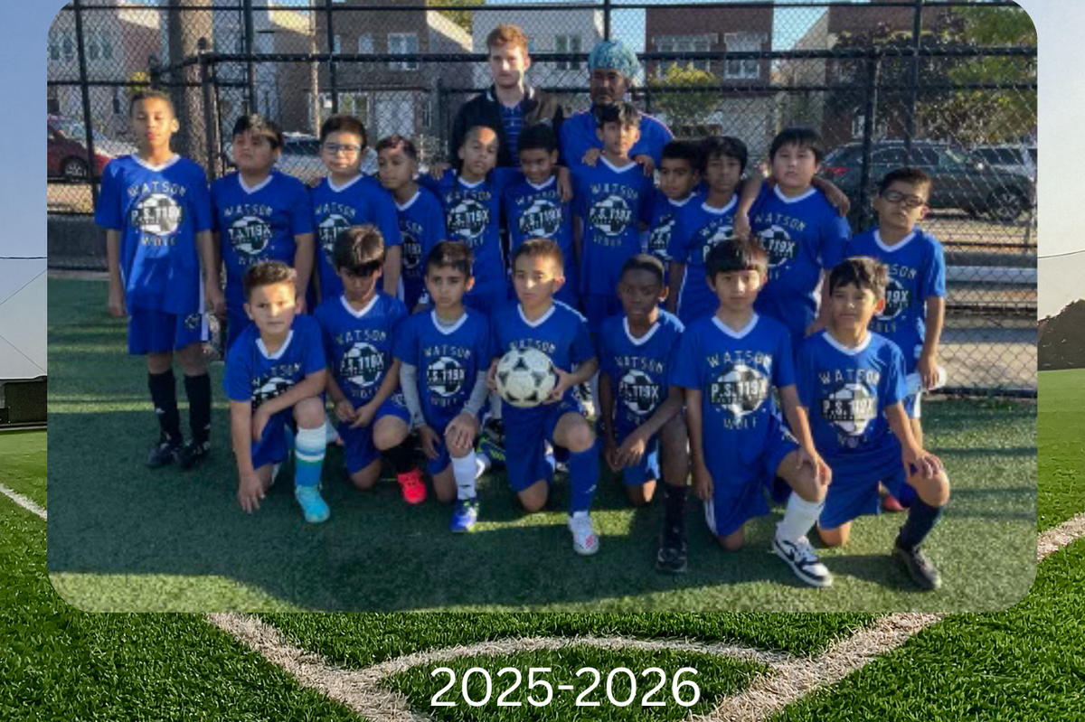 Group of P.S. 119 soccer players in blue jerseys posing for a team photo.