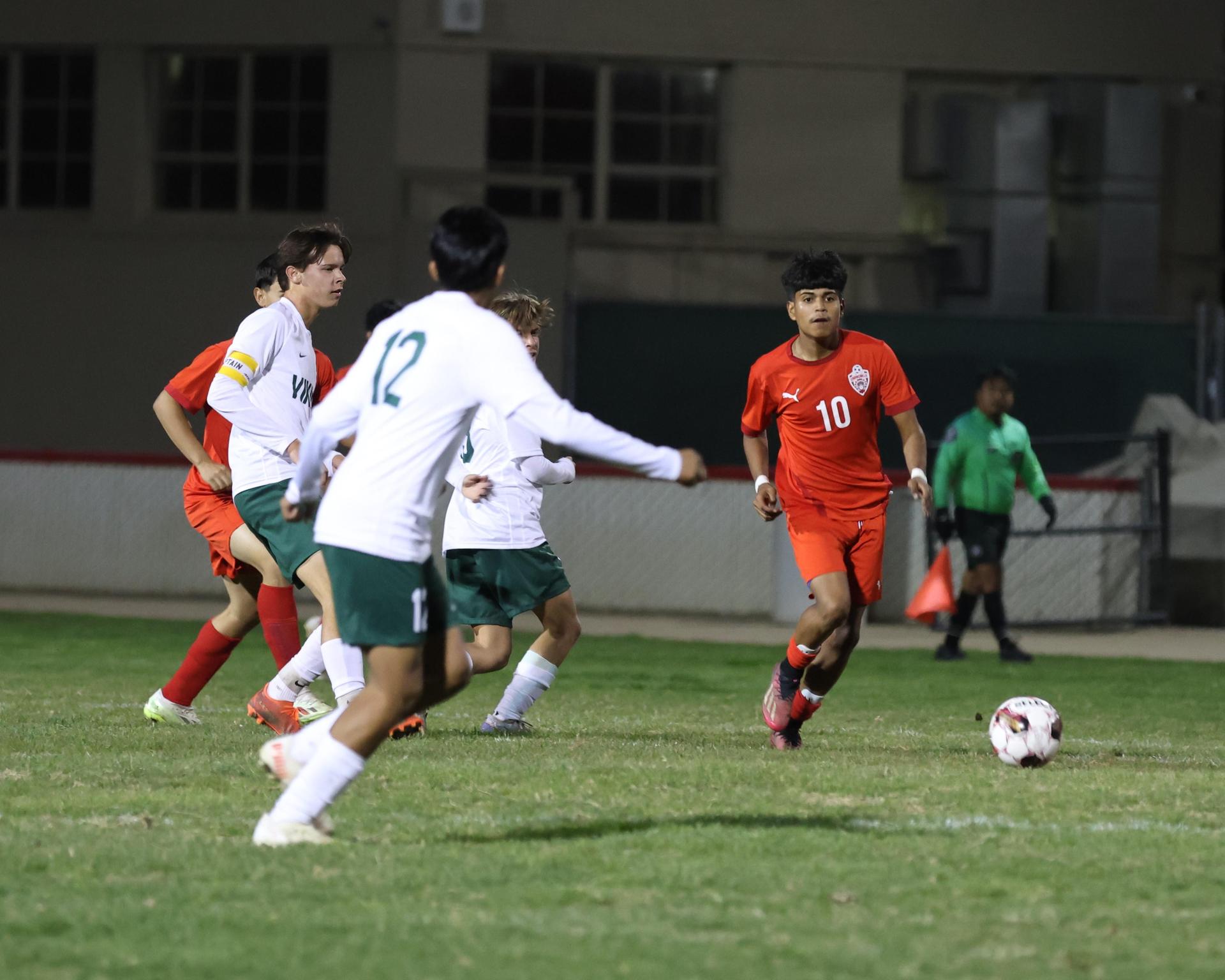 Varsity boys play soccer against Kingsburg