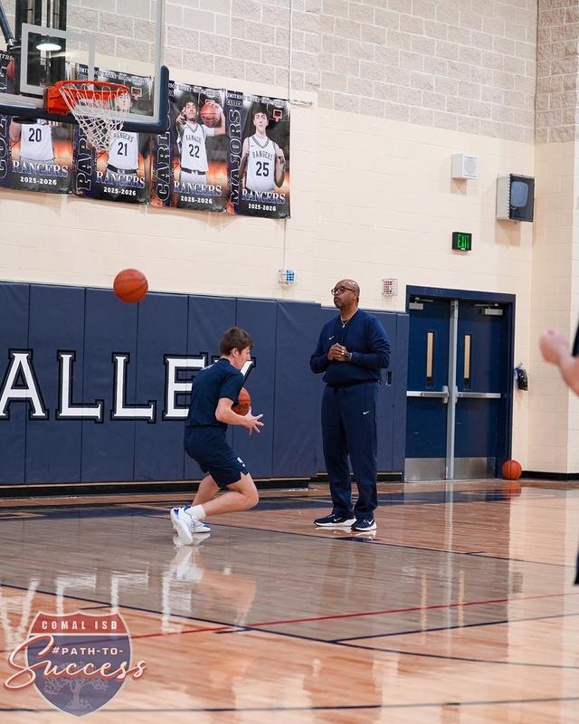 - Smithson Valley High School Basketball Team observed by Head Coach Ike Thornton