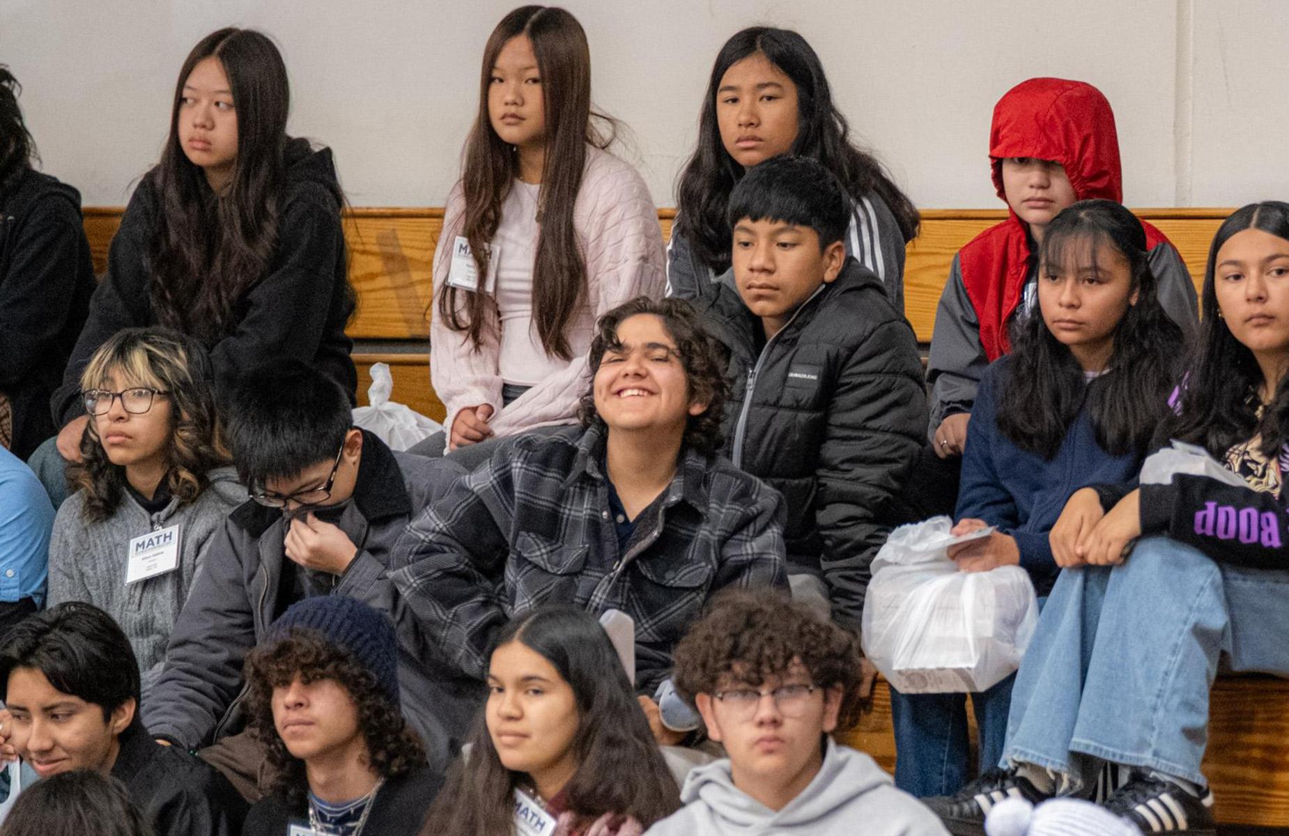 student smiles at camera