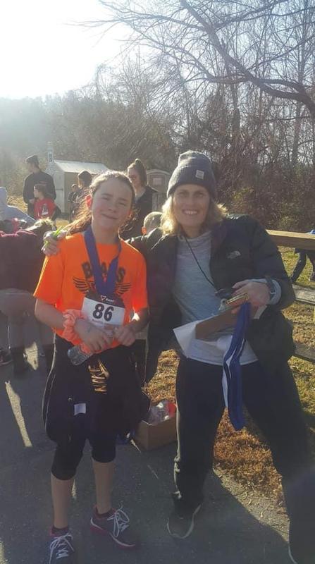 Ms wyatt and student at 5k race