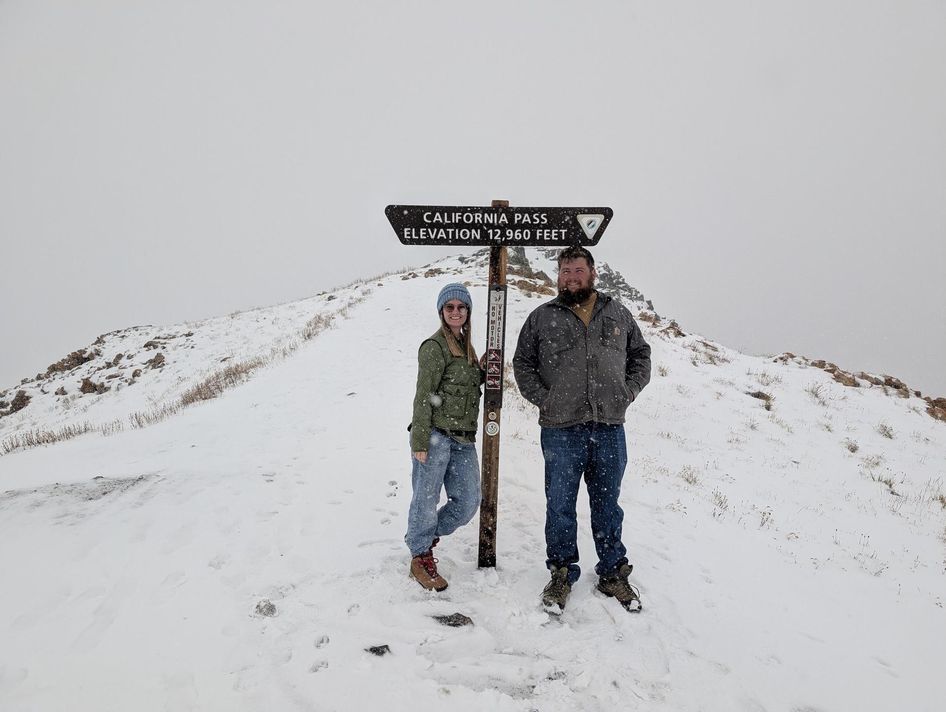 Mrs. Brittany and her husband in the mountains