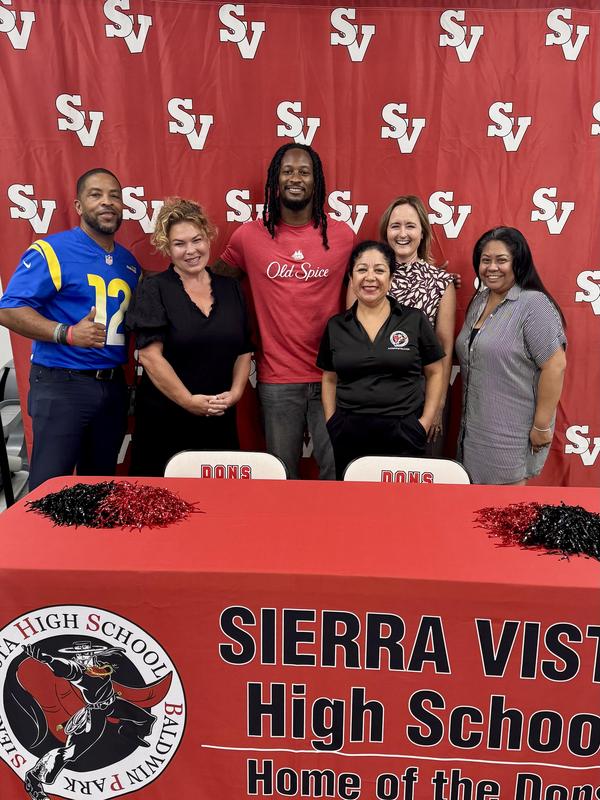 NFL Pro Todd Gurley snaps a pic with the SVHS administration team and Athletics Director Robyn Reclusado