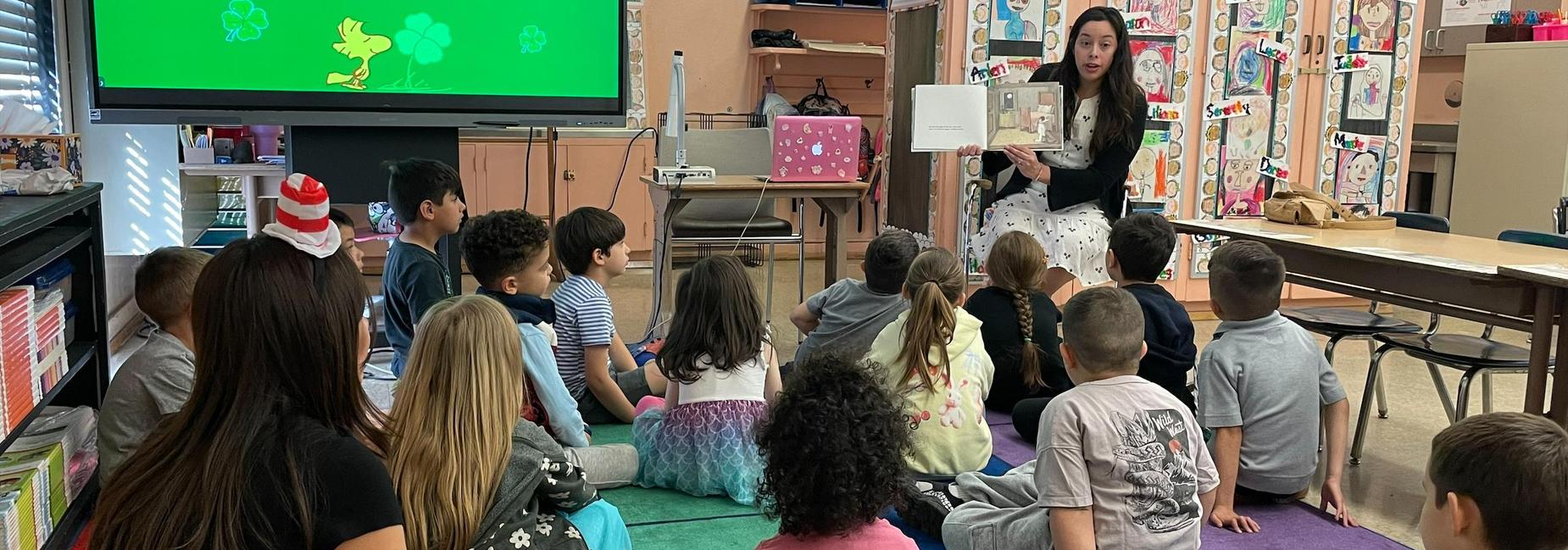 Board Member Kelly Gonez reading to Apperson students for Read Across America
