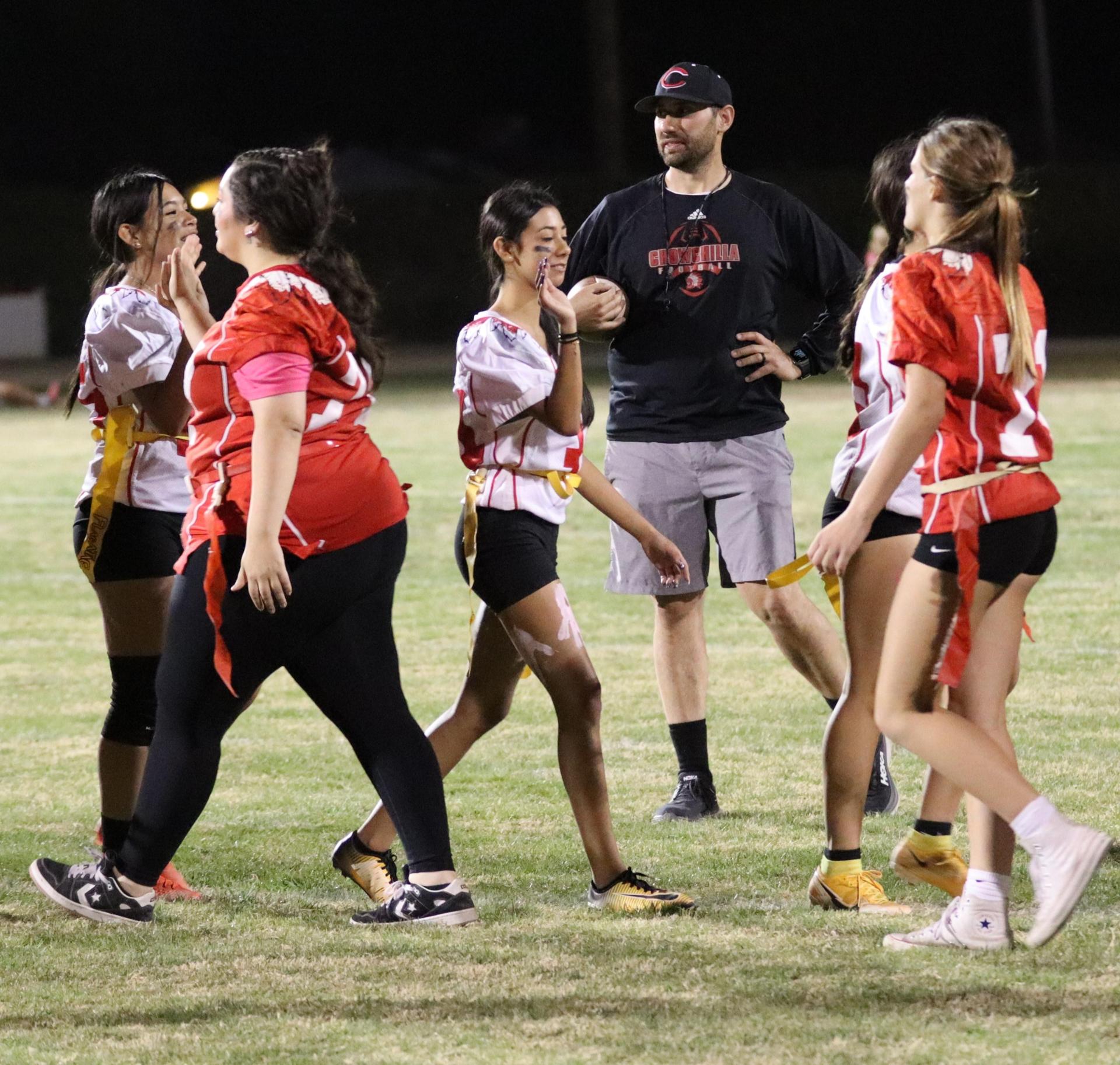 students shaking hands after the game