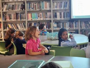 The students participate in a class discussion about Sick Days