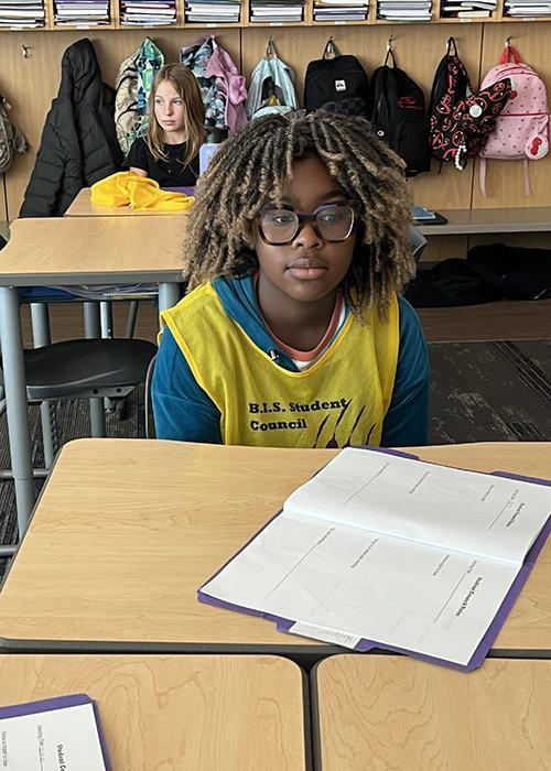 Student Council members listen at the meeting.