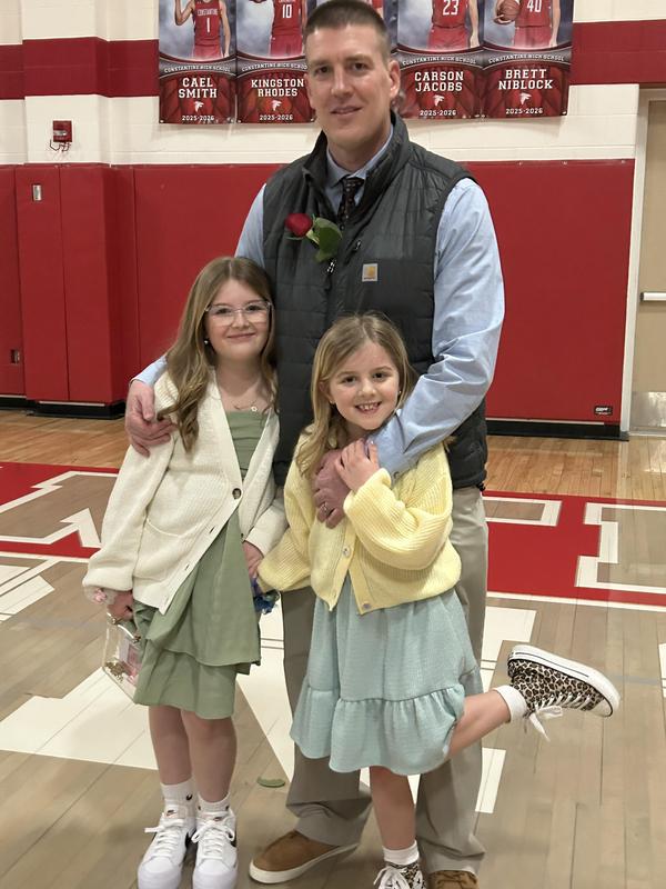 father and two daughters