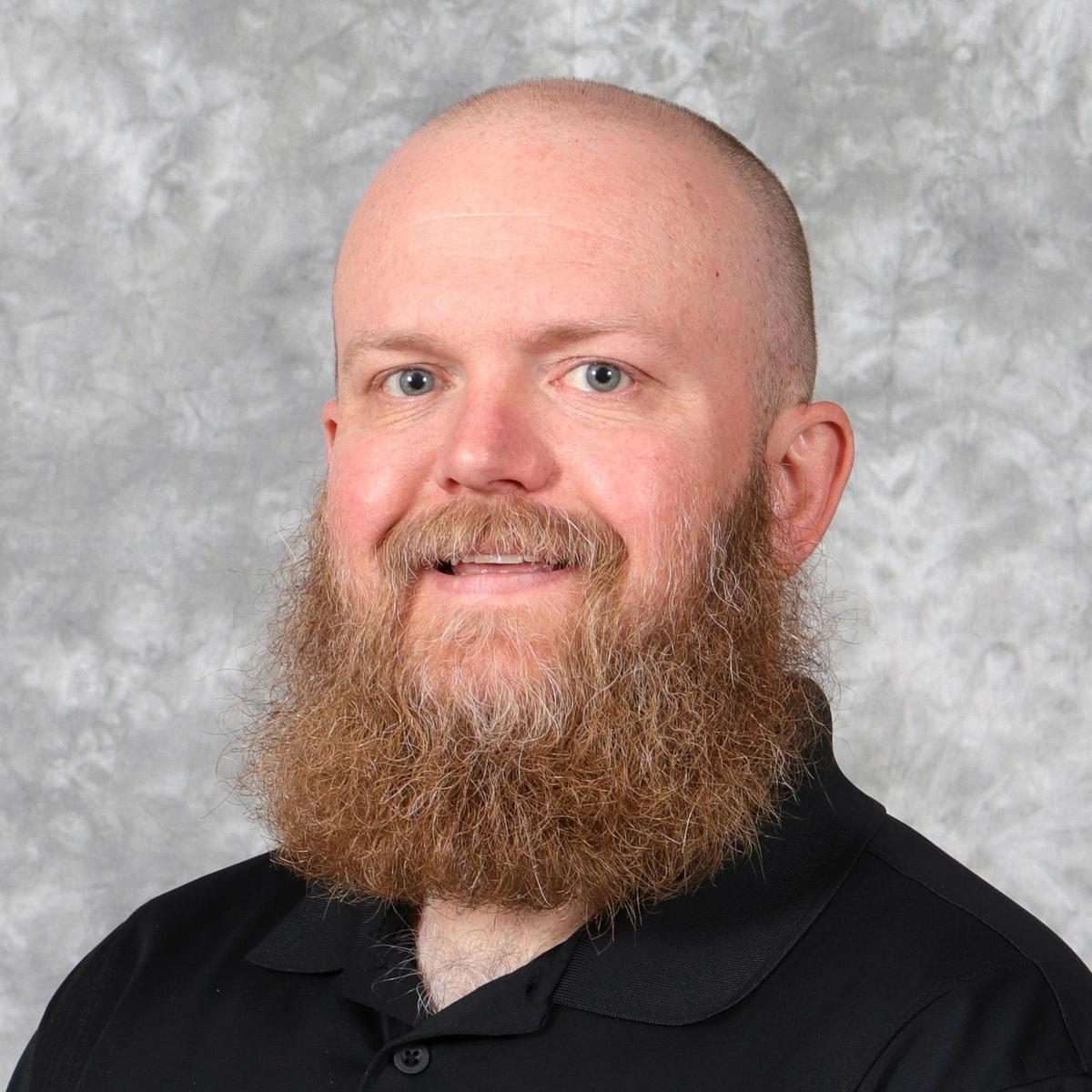 Photo of the lead instructor, Blair Jensen.  A beautiful, bald, bearded, beast of a man.