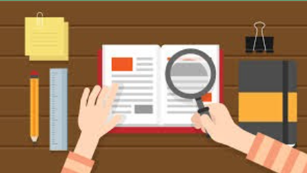 Person reading a book for research