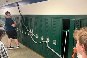 Cole O’Hern, Zayn Carty, and Adithri Pingali test their coaster track