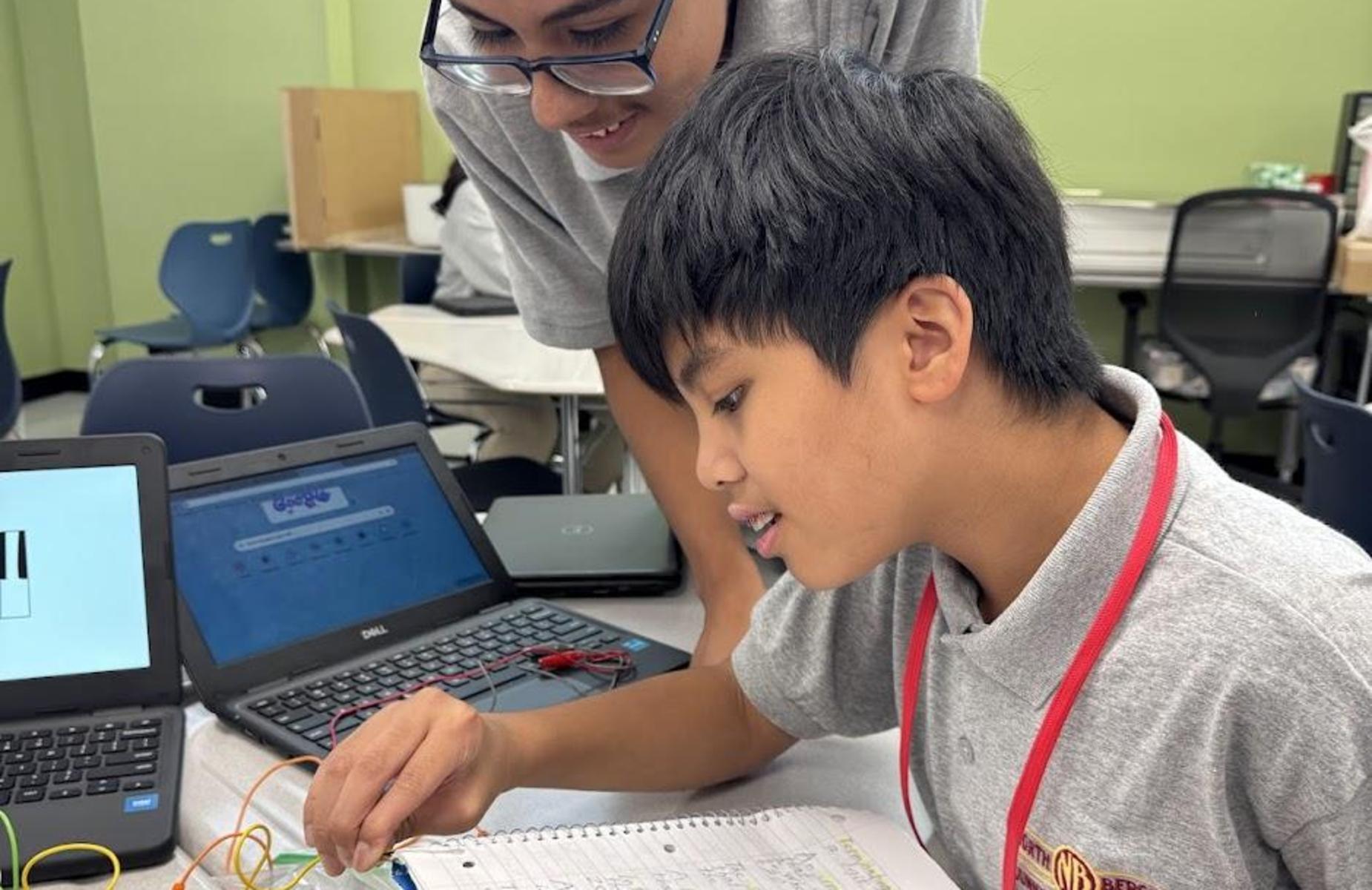 two students working