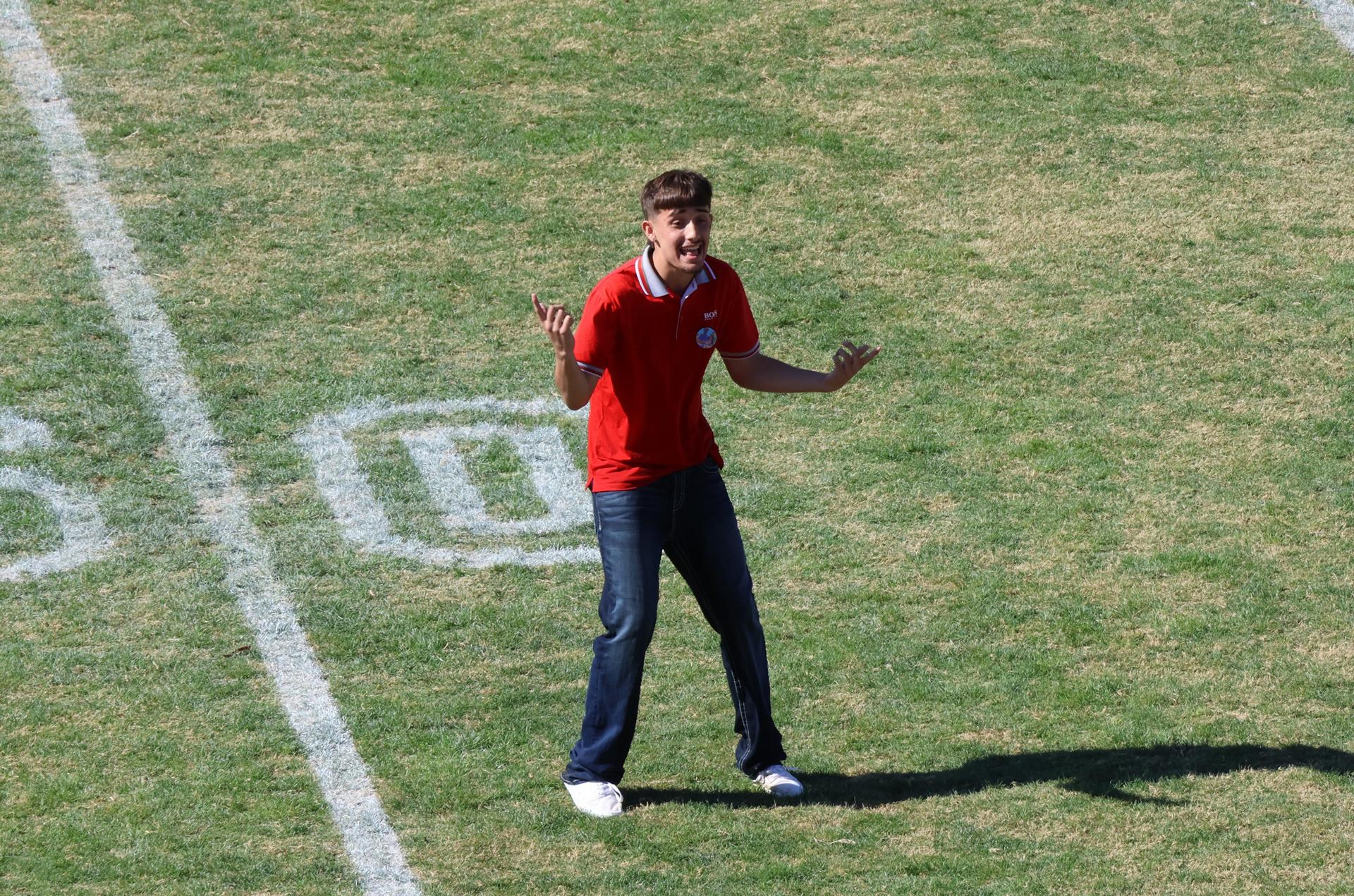 students and staff at the homecoming rally
