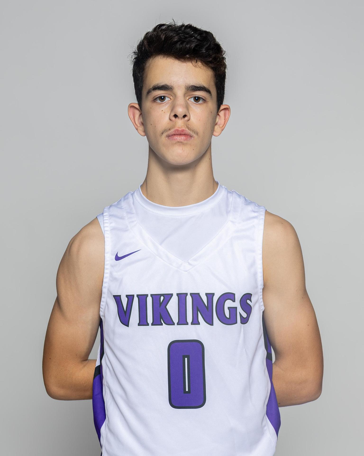 Male player number 0 posting for the roster