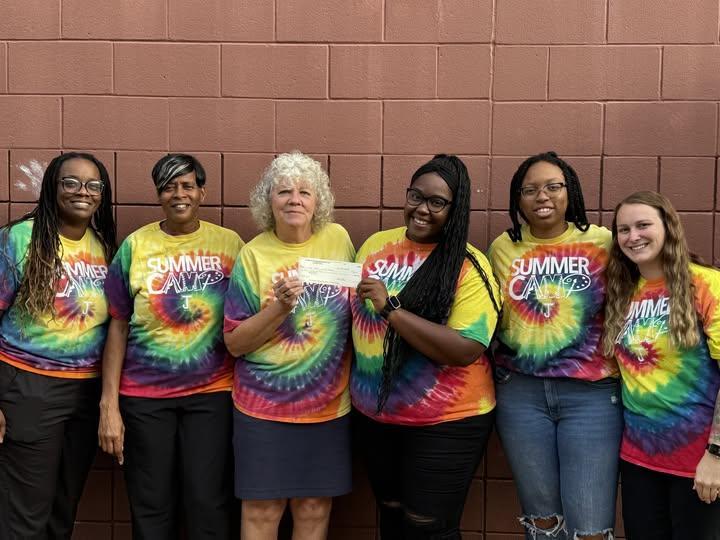Our Gryphon Kids Club Summer Staff poses for a photo together.