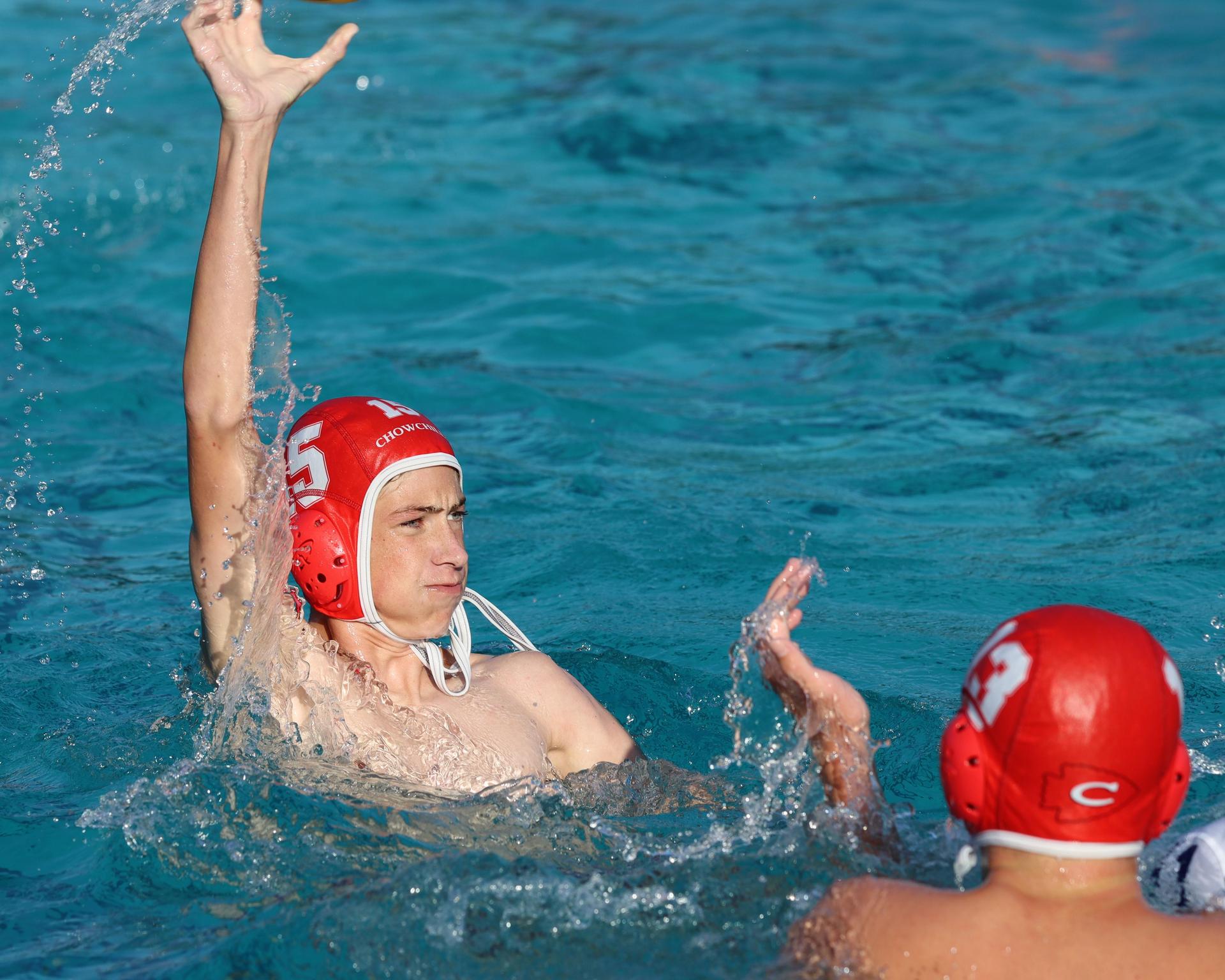 Boys playing water polo against Yosemite