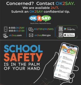 Hand holding phone with OK2SAY app