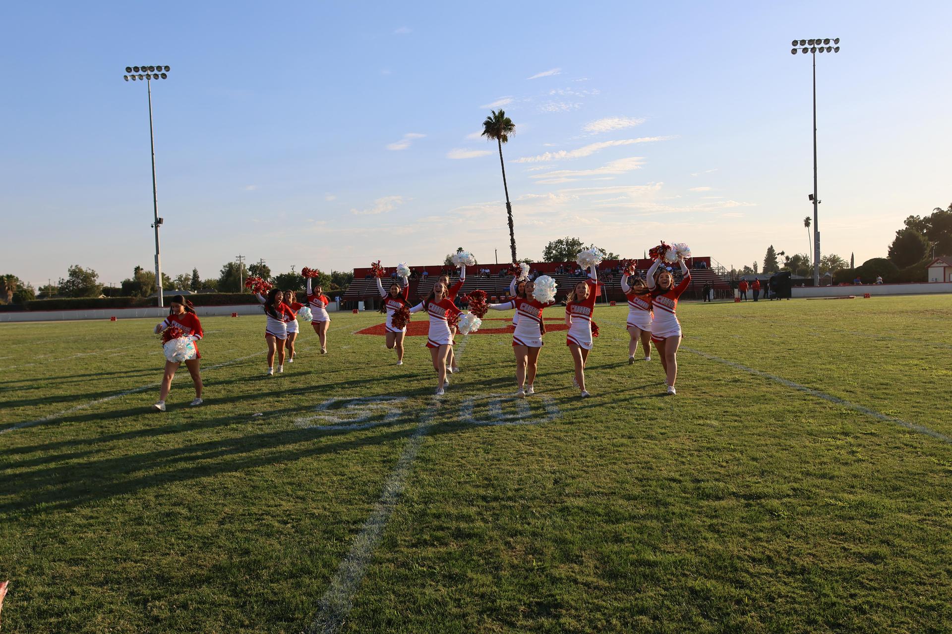 Junior Varsity Cheerleaders in action at halftime 11