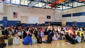 Stanley Tucker speaks to Penn Yan Elementary students