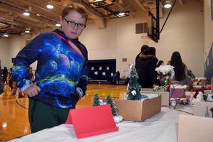 students looking at dioramas based on the movie Home Alone