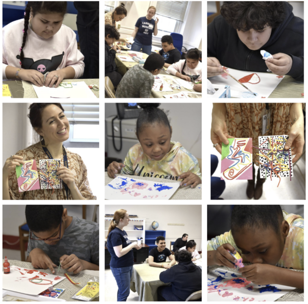 Students interacting with teachers while making small art projects.