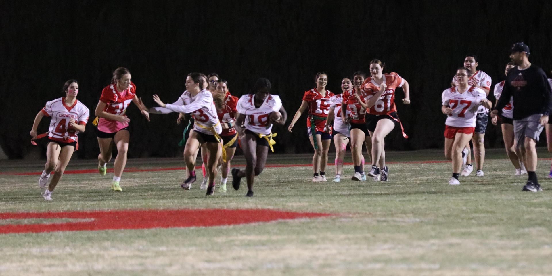 girls playing flag football