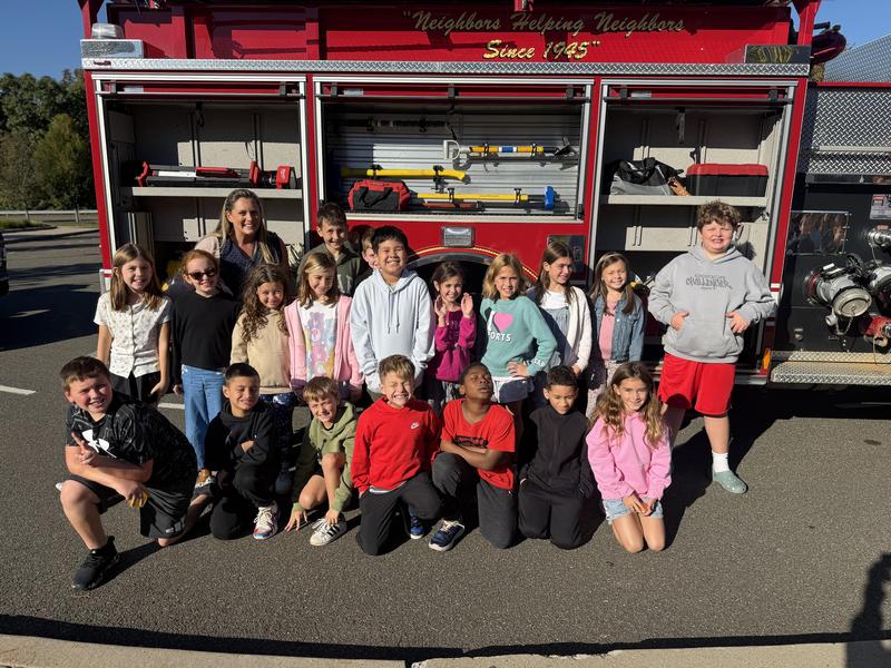 Students and fire truck for fire prevention week