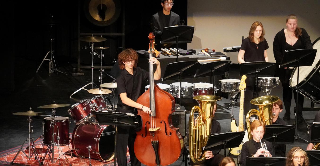 Students perform in the symphonic band concert.