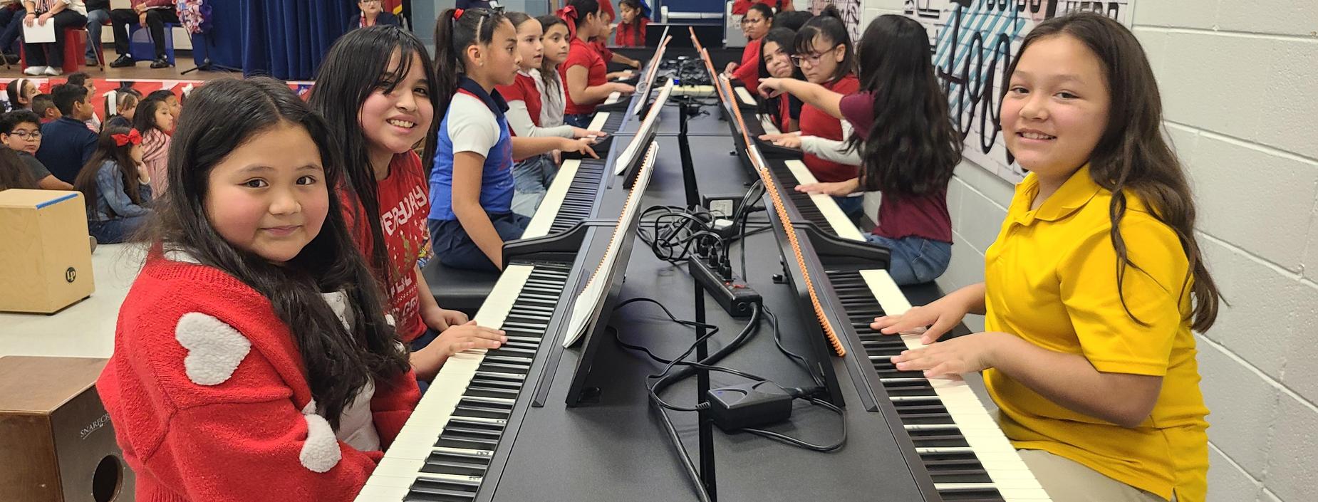 Students playing piano