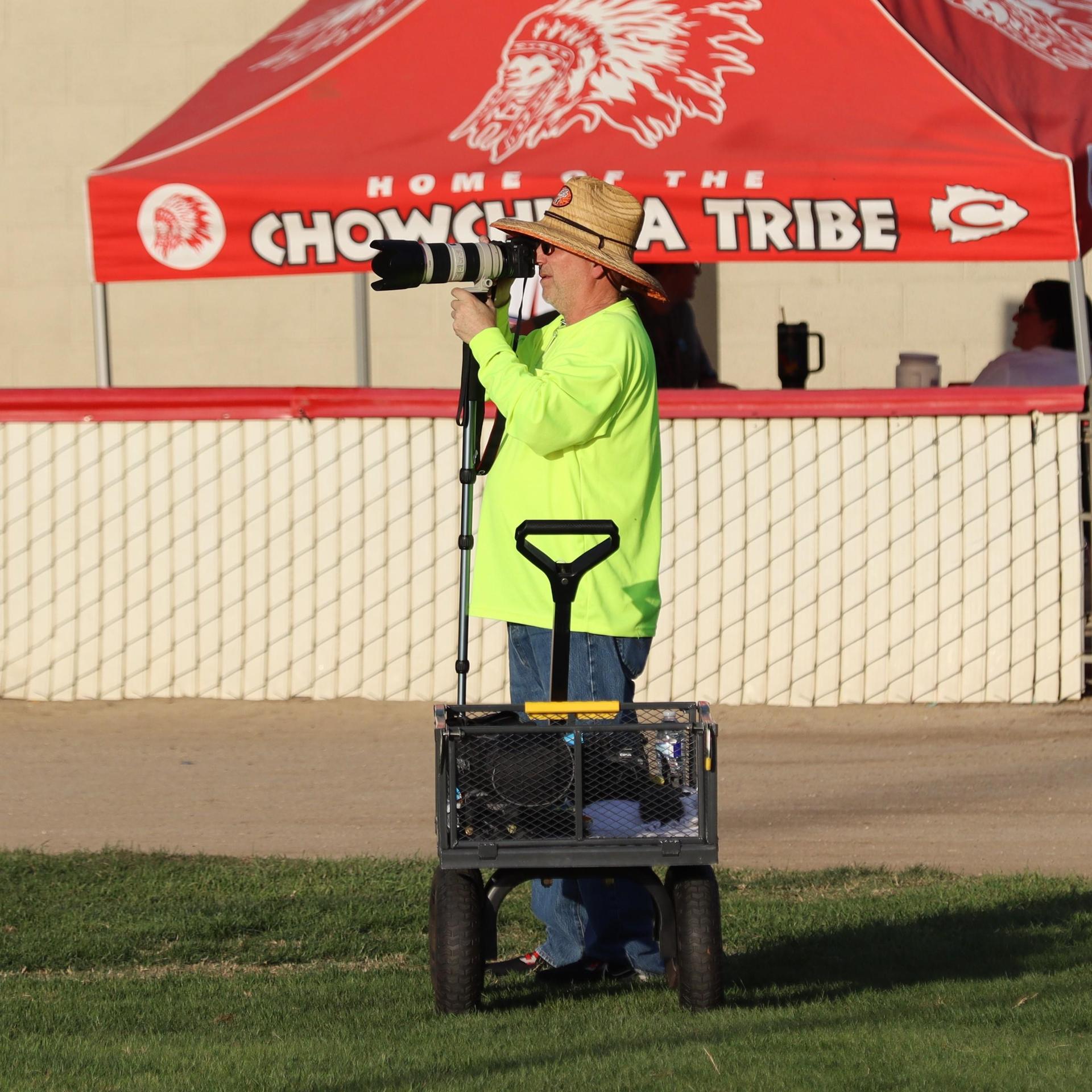 photographers in action against Caruthers
