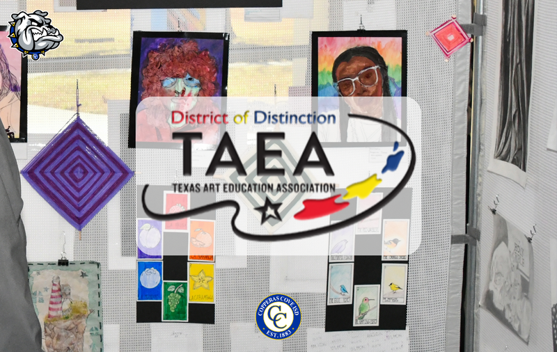 Art display featuring various student artworks and a prominent logo.