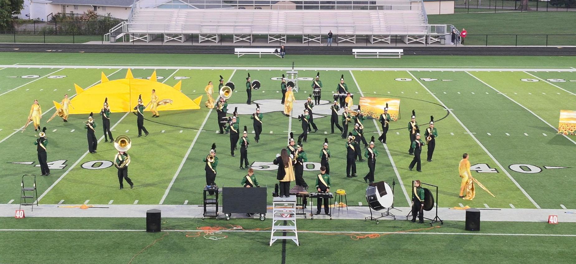 Coloma Marching band performing their show title Sunshing